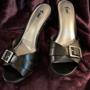 Fioni black leather 3” heal with silver buckle. Size 9 Like new